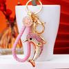 Rhinestone Crafted Beautifully Dolphin Keychain With Colorful Rope Perfect For Gifting