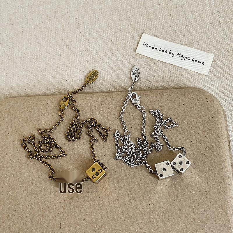 Женское уникальное ожерелье-подвеска в виде игральных костей планеты – Стильный и универсальный чокер для модного акцента.