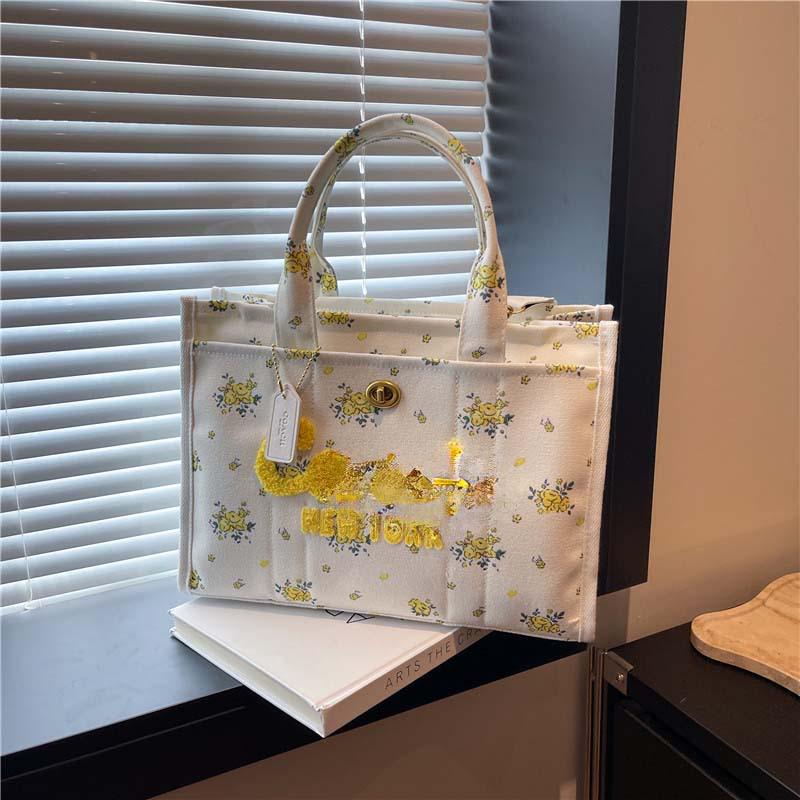 2025 Hot-Selling Large Capacity Canvas Tote: Stylish Commuter & Crossbody Bag.