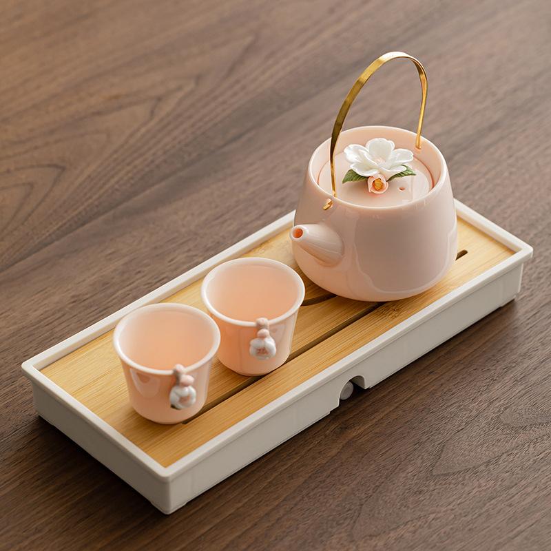 Raw ore powder mud, handmade flower jackpot, one pot and two cups, dry brewing Kung Fu tea set, small set, women's teapot, teacup