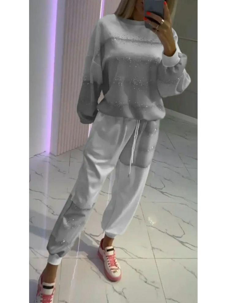 Женский повседневный комплект из топа с брызгами и полосками и брюк на кулиске - Коллекция 2025