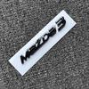 Черные Воинские передний и задний значки для Mazda 3 Axela (зарубежная версия)
