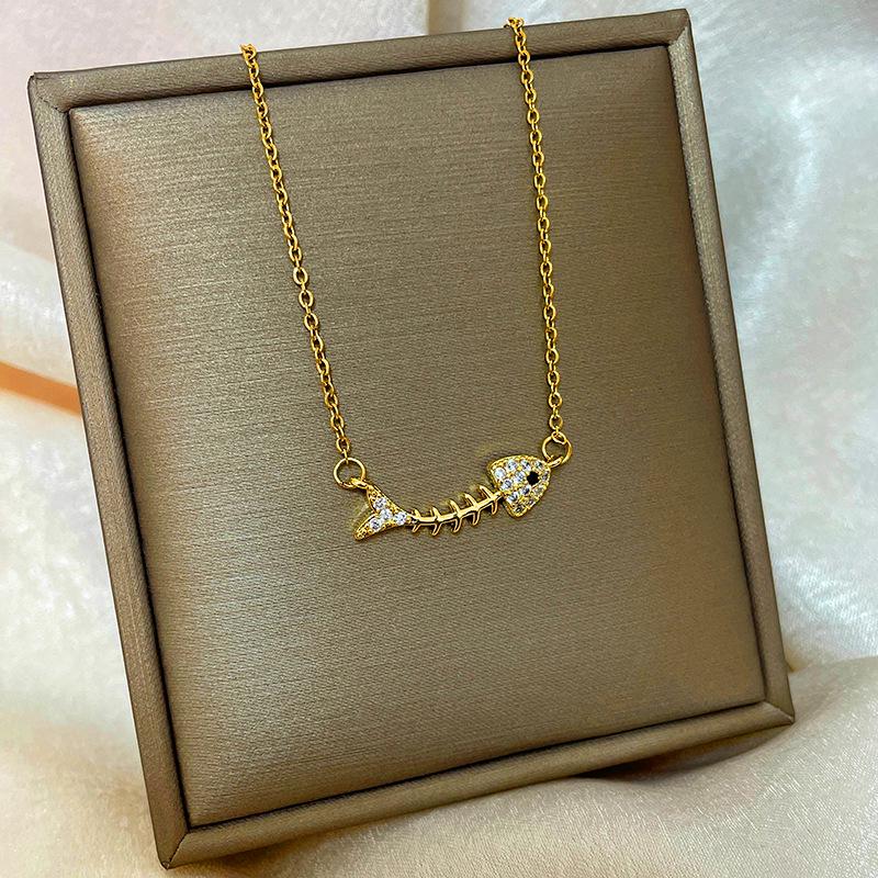 Позолоченная медь 18 карат, цепочка на ключицу с дизайном абака, тыквы-горлянки и лебедя.