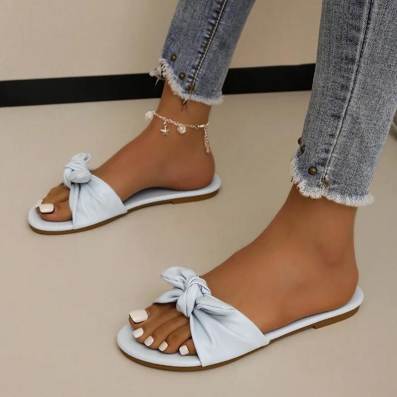 Модная обувь для женщин 2024 года, горячая распродажа, женские тапочки с открытым носком, летние однотонные повседневные пляжные тапочки на плоской подошве, удобные тапочки