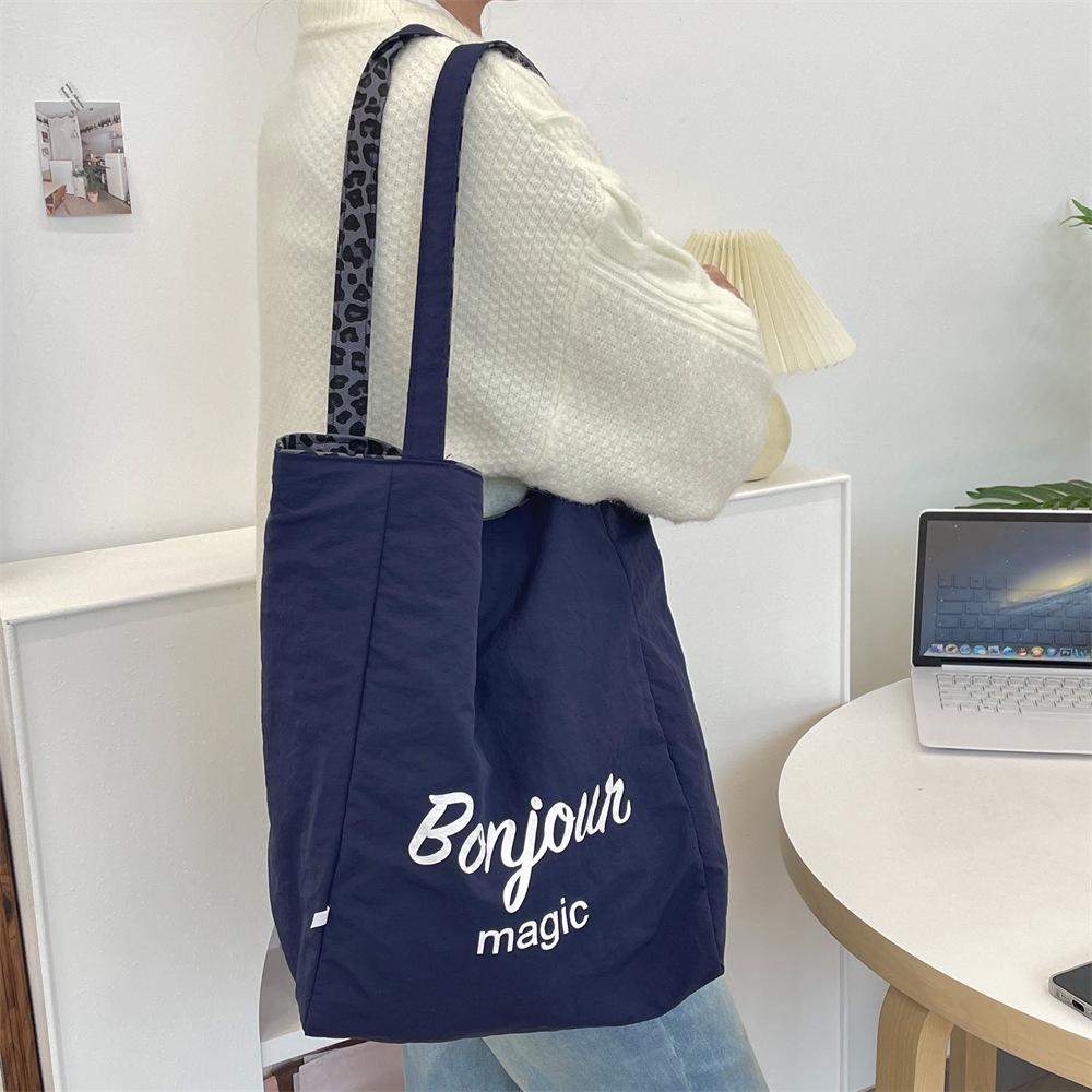 Холщовая сумка с леопардовым принтом: Женская сумка через плечо большой вместимости, коллекция Осень/Зима 2024, новый дизайн двойной сумки.