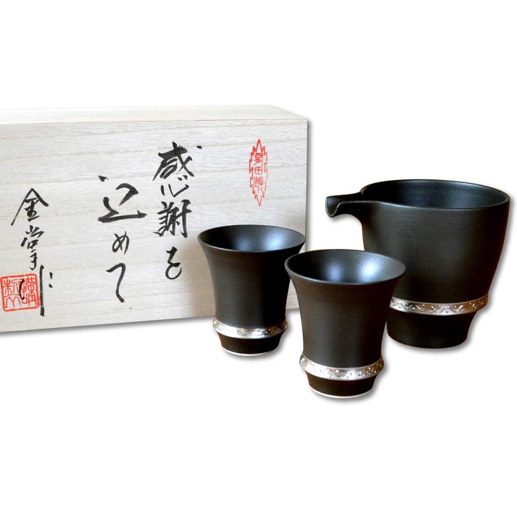 A Stylish Arita Ware Sake Set Featuring a Sake Bottle and Two Sake Perfect for Retirement Features Include a Finish and a Wooden Cups, Gifts.