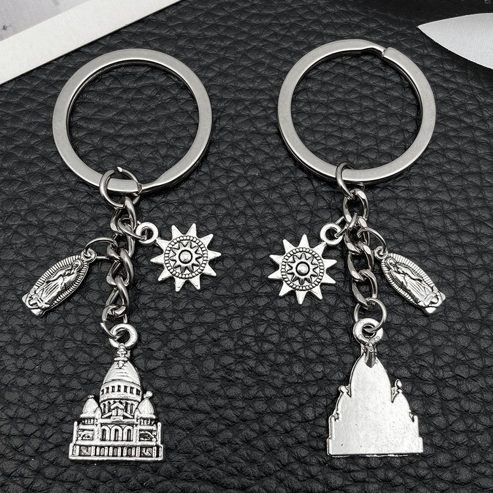 Ancient Silver Castle Sun Statue Zinc Alloy Keychain - Creative Backpack Accessory and Commemorative Pendant.
