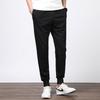 Повседневные брюки мужские летне-осенний тренд зауженные большого размера показывающие рост свободные жир однотонные спортивные на резинке девятиточечные брюки универсальные