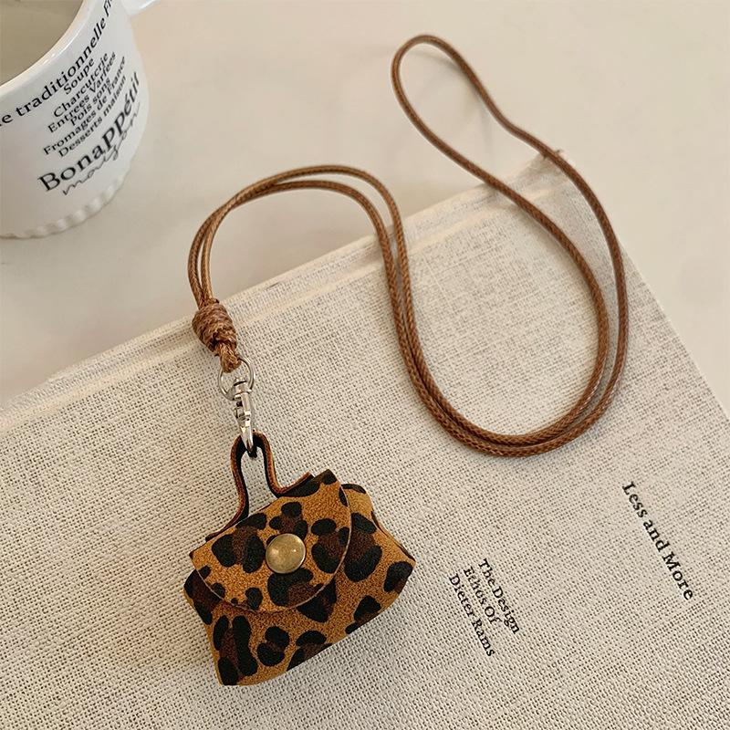 Ожерелье-кошелек для монет с леопардовым принтом: Женский кулон-чехол для наушников с кожаной цепочкой