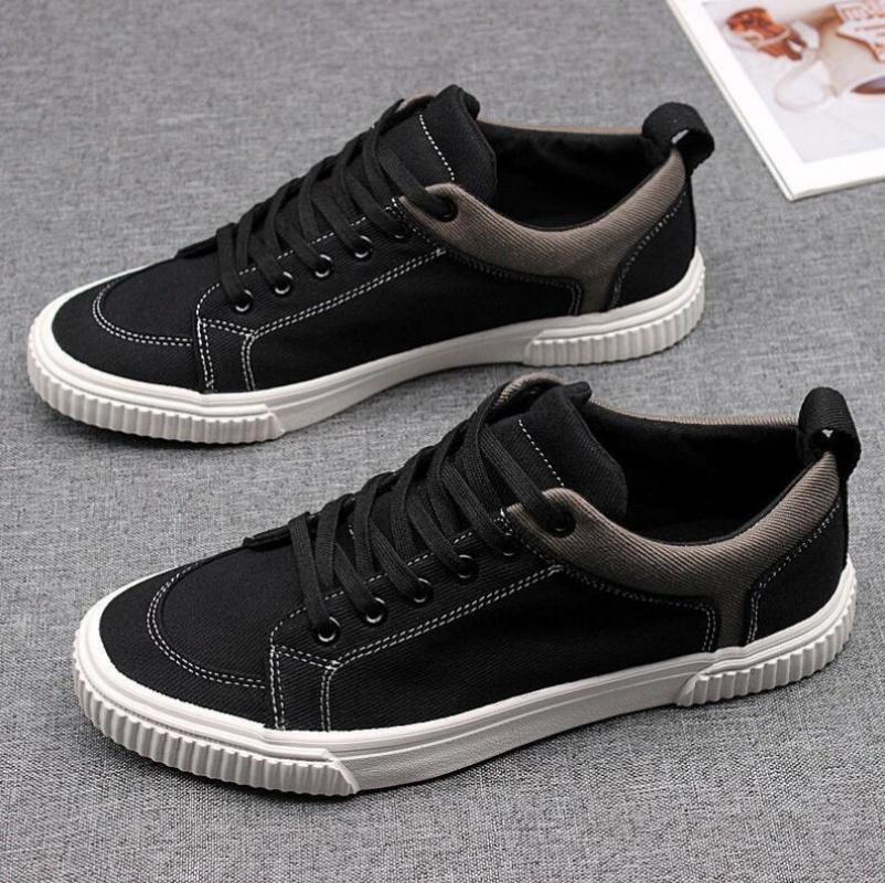 Fashion Men's Spring Canvas Shoes New Breathable Lace Up Casual Men's Versatile Flat Bottomed Cloth Shoes Anti Skateboard Shoes Tenis