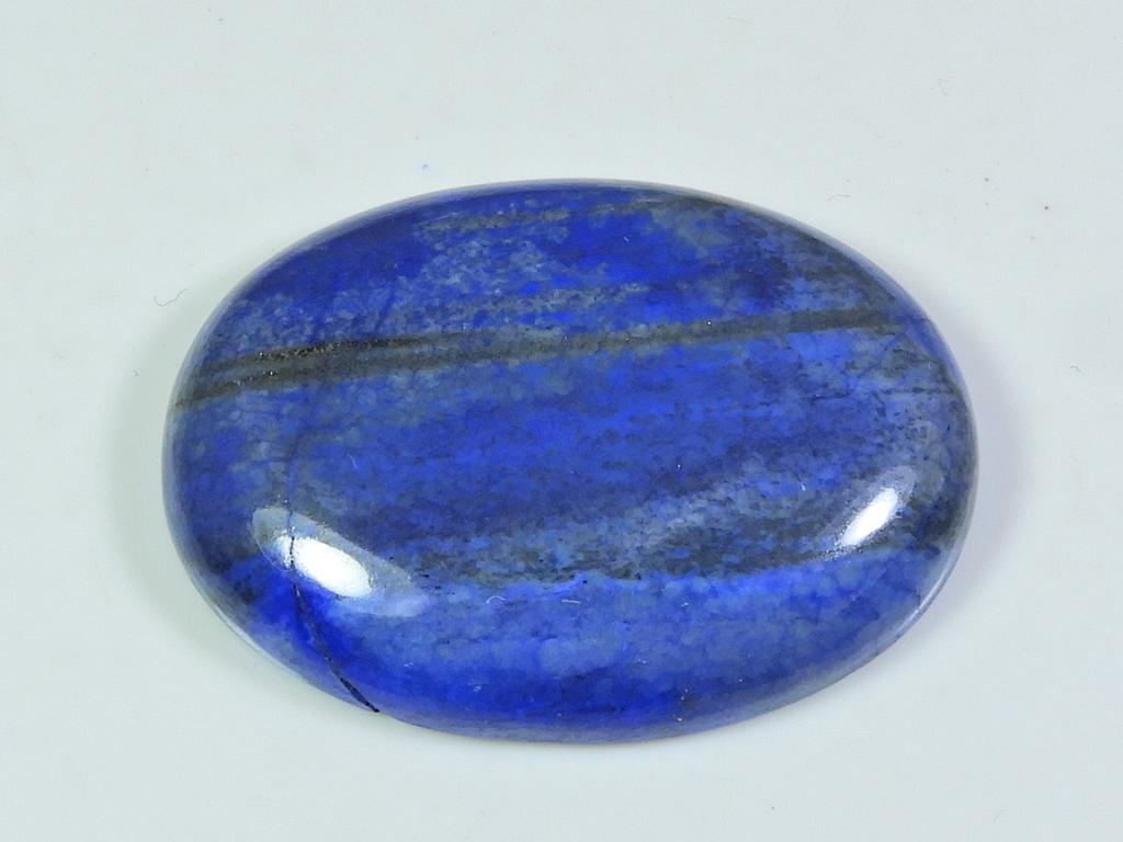 Натуральный голубой лазурит овальный кабошон россыпью драгоценный камень 75 карат. 28X38X07 ММ ET-119