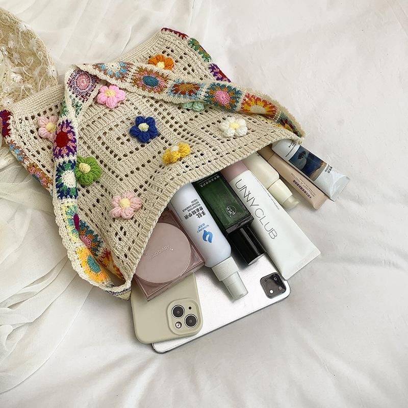 Flower handwoven bag women's 2025 new summer niche seaside vacation beach bag versatile shoulder messenger bag