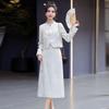 Suit Skirt Women's Spring and Autumn New Design Sense Tassel Buckle Jacquard Small Coat Skirt Two-piece Set