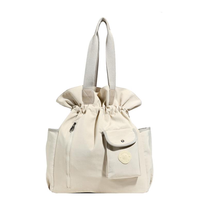 Сегодняшние популярные сумки, новые летние плиссированные нишевые сумки через плечо, универсальные сумки-ведра мессенджеры