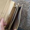 Used PRADA Bi-fold wallet with gold ribbon