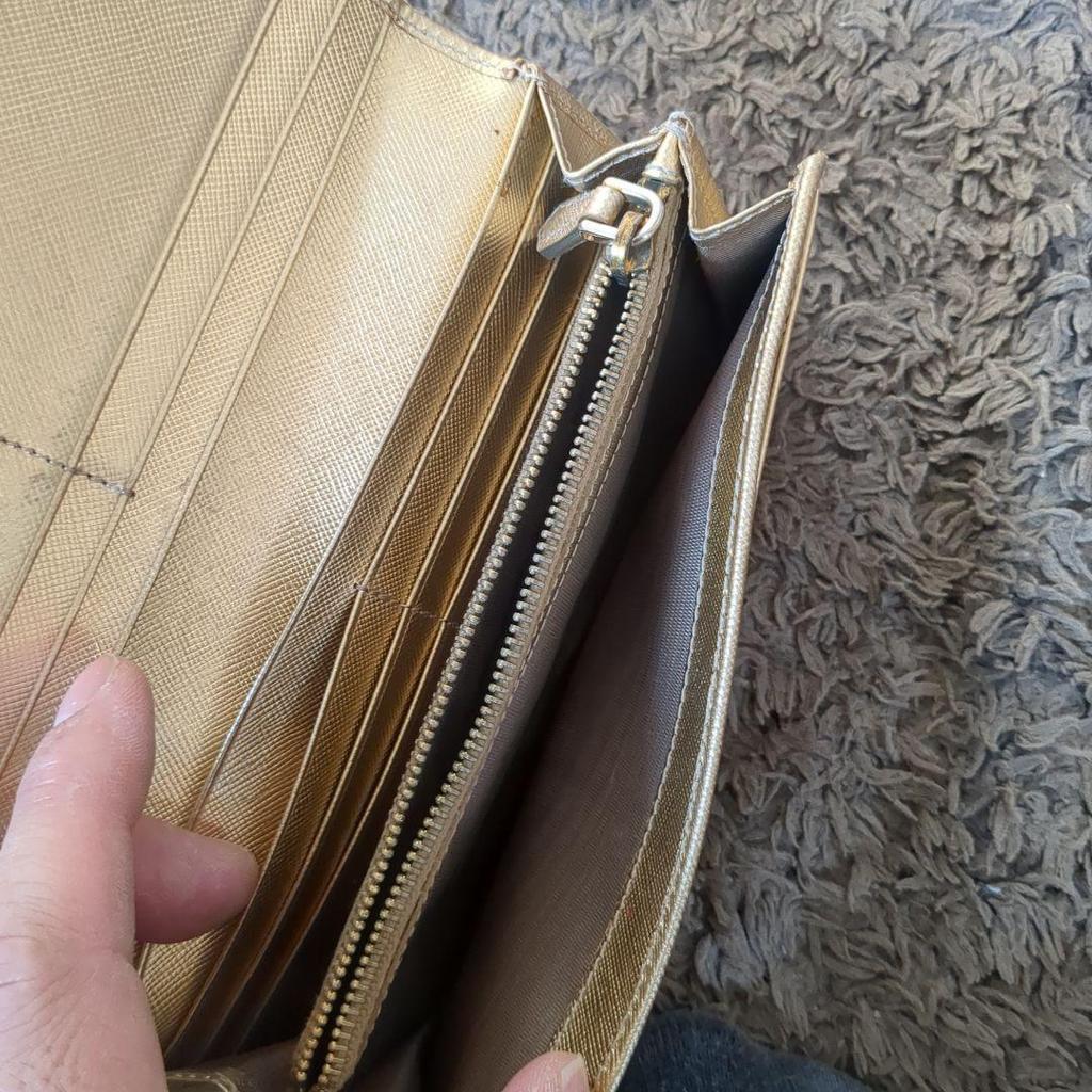 Used PRADA Bi-fold wallet with gold ribbon