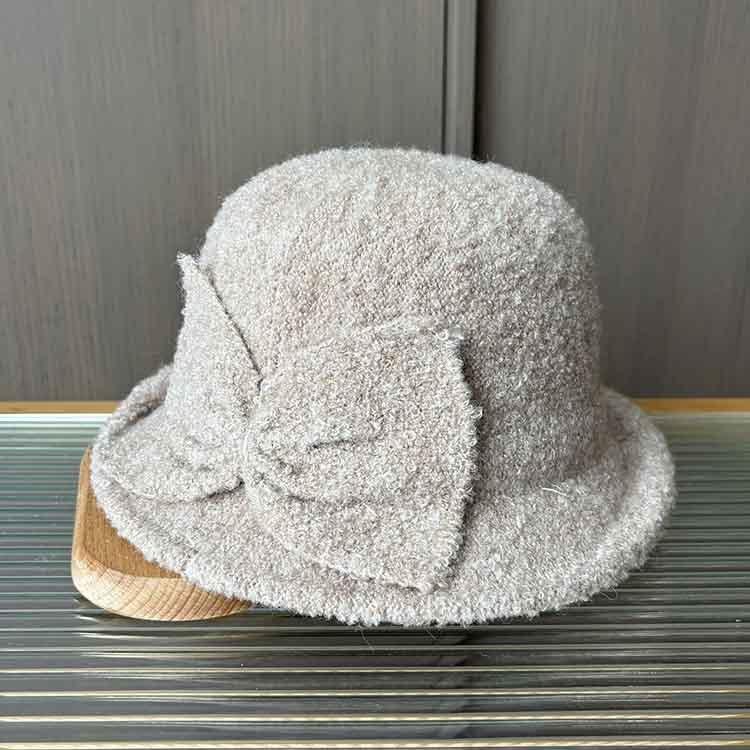 Autumn and winter elegant bow plush basin hat fashionable warm bucket hat versatile face small curling edge bucket hat
