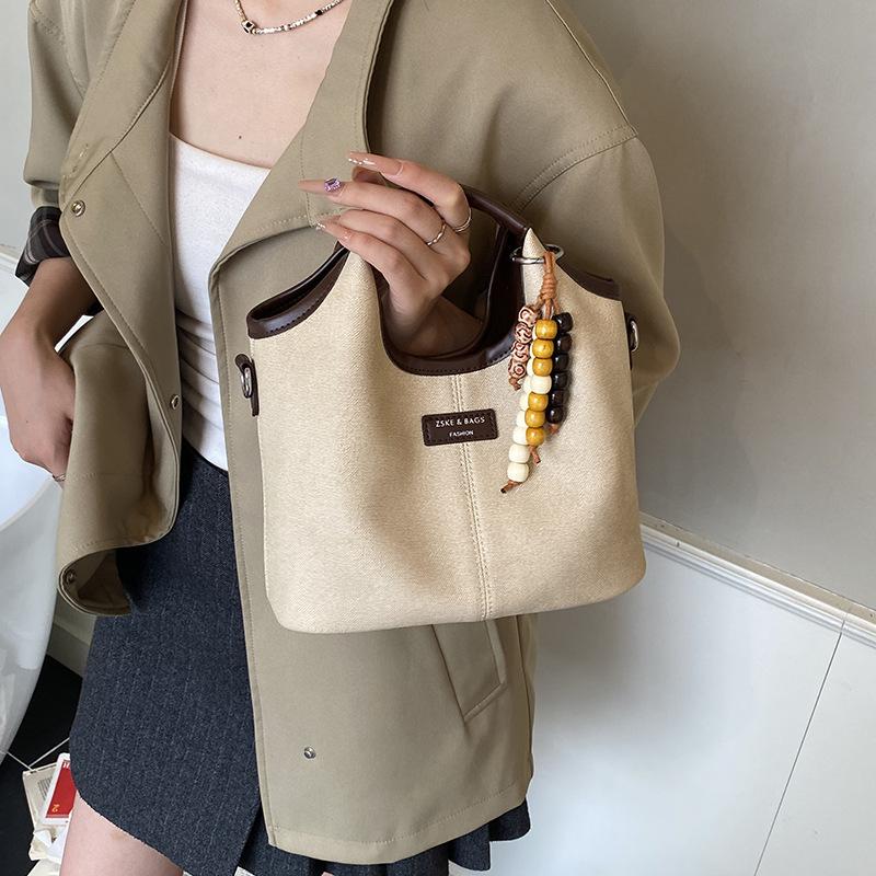 Премиальная женская сумка 2025 новая модная дорожная сумка на плечо, повседневная универсальная сумка-мессенджер, сумка-ведро