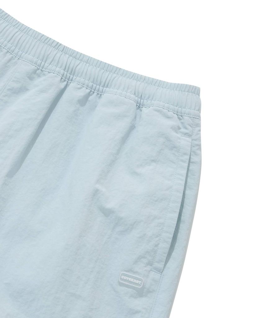 COVERNAT WOMAN Sheer Nylon Windbreaker Shorts Light Blue
