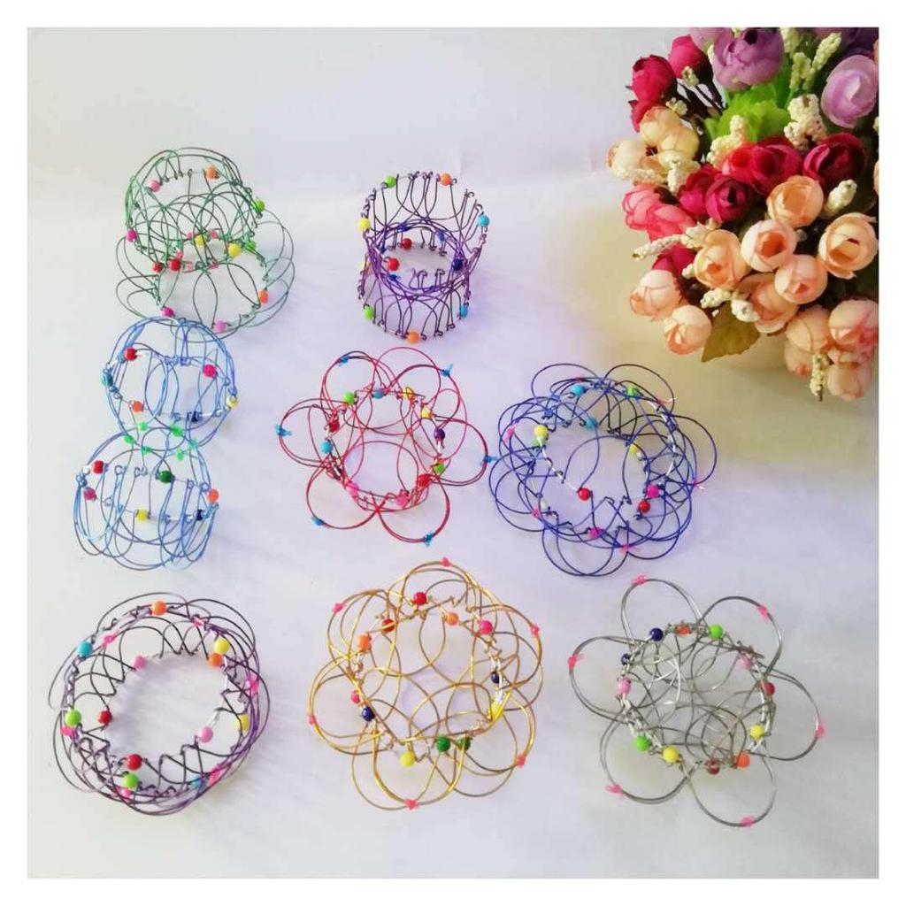 Soft Steel Magic Iron Ring: Nostalgic Flower Basket Toy for Kids - 36 Transformations
