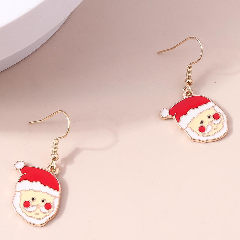 Рождественские серьги-снежинки с лосем и Сантой с характером