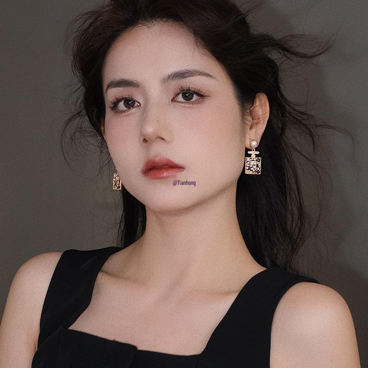 Роскошные серьги-подвески с жемчугом: Шикарный летний отпускной стиль 2025 для женщин