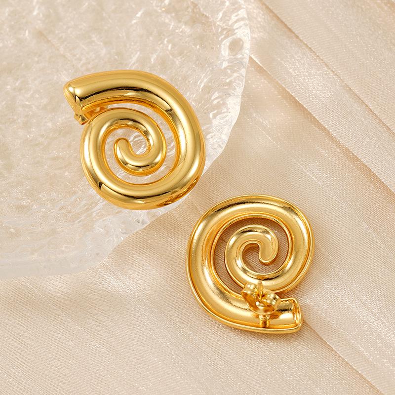 Минималистичные металлические серьги-спирали: Уникальный европейский и американский дизайн, женский нишевый стиль, передовые темпераментные серьги-пусеты.