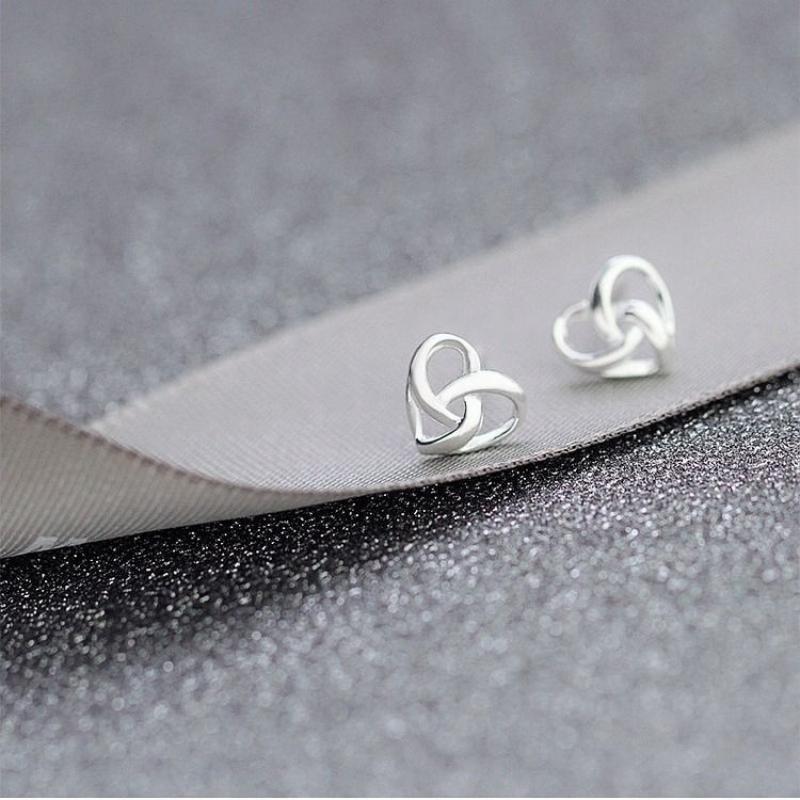 Медные женские серьги в виде переплетённых сердечек