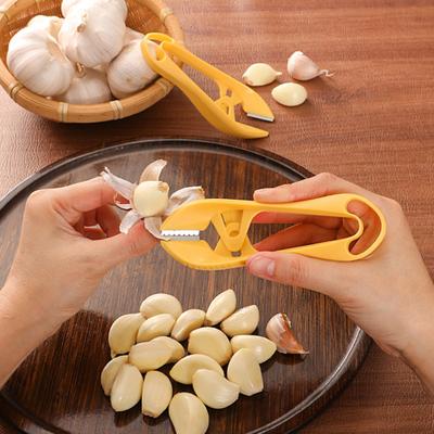 Yousheng Овощечистка для чеснока из нержавеющей стали, ручной инструмент для чистки чеснока с подвесным отверстием, кухонная утварь для быстрой очистки от кожуры