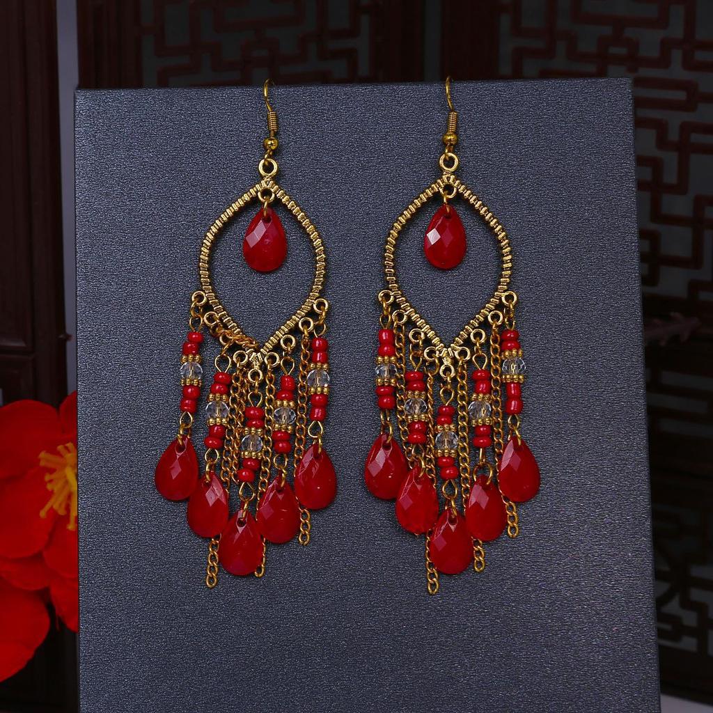 Серьги-кисточки с рисовыми бусинами и каплями воды в стиле бохо - этнический стиль, яркая индивидуальность