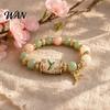 Symbolic Jewelry Bluebird Blessings Bracelet, Inspirational Hummingbird Strength Beaded Green Nature-inspired Bracelet Beads Cherry Blossoms for Women