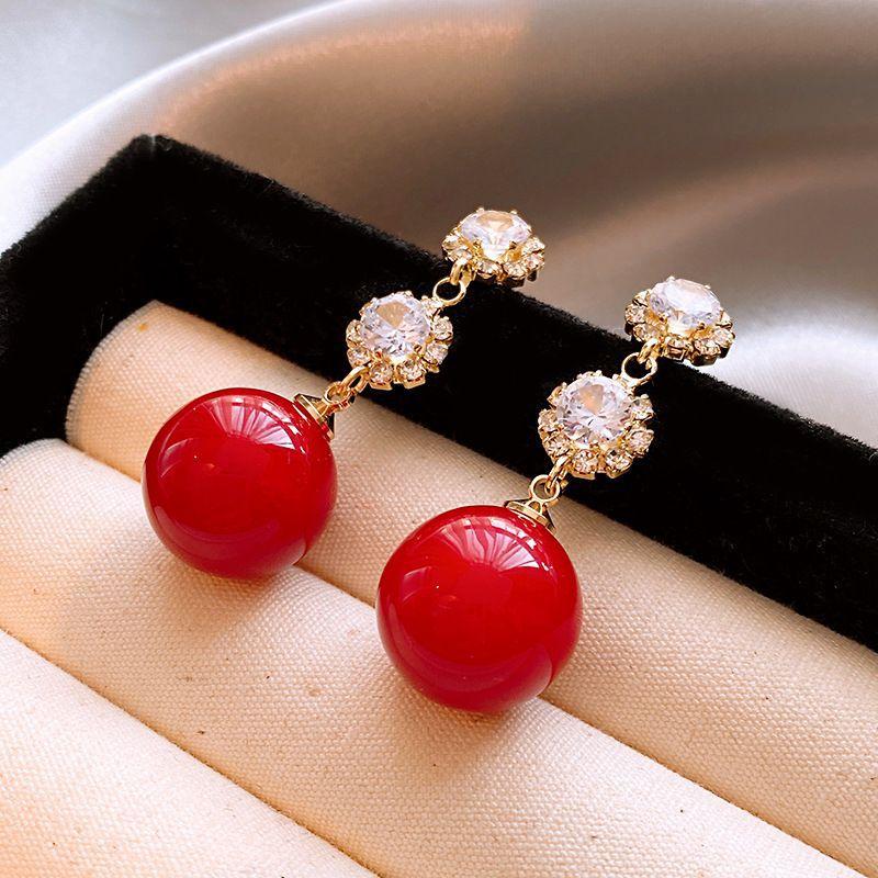 Silver needle zircon flower pearl earrings New Year's light luxury high-end stud earrings retro temperament red earrings women