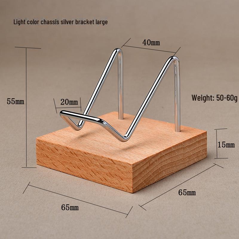 "Heart-Shaped Crystal Mineral Specimen On Iron Stand with Wooden Jewelry Display"