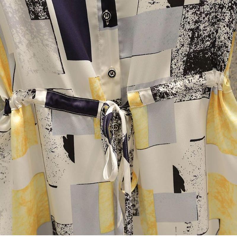 Большой и красивый: Женская летняя блузка больших размеров с дизайном, закрывающим животик