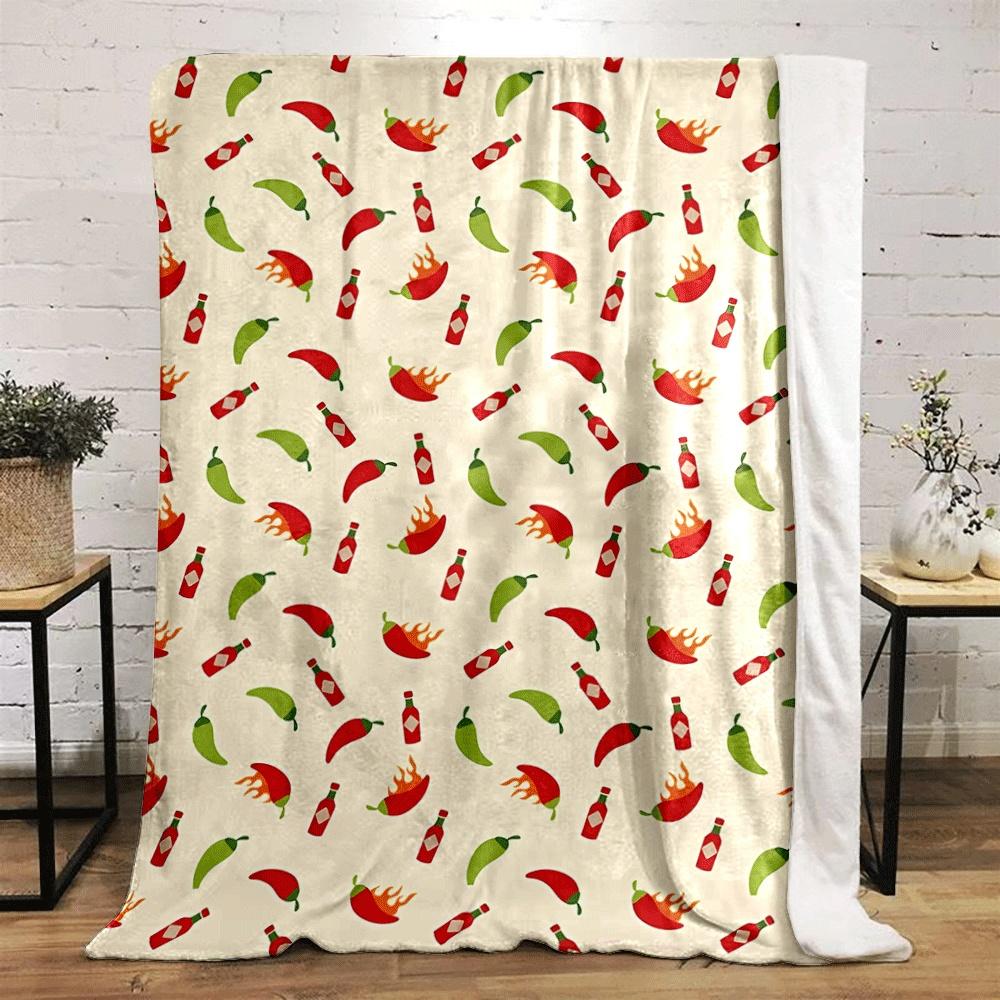 The pattern shows chilies, hot sauce bottles, and flaming chili peppers. for all seasons blanket lunch break throw gift