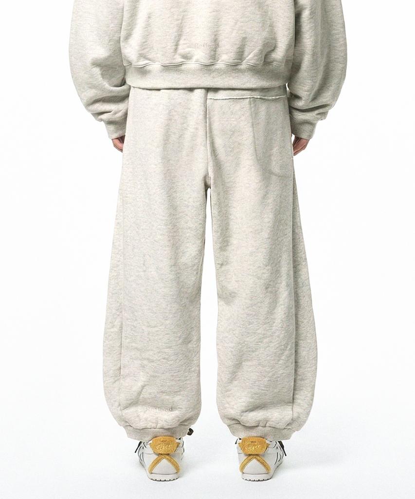 PRINOAR Refined Oblique Curved Sweatpants - Oatmeal