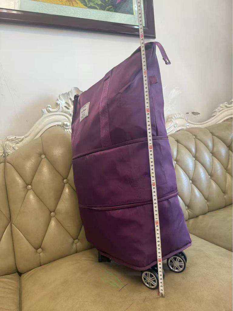 Дорожная сумка на колесах со складной ручкой