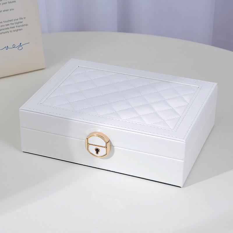 «Вместительная запирающаяся шкатулка для украшений с тремя ярусами и современным ромбовидным узором для ожерелий и сережек»