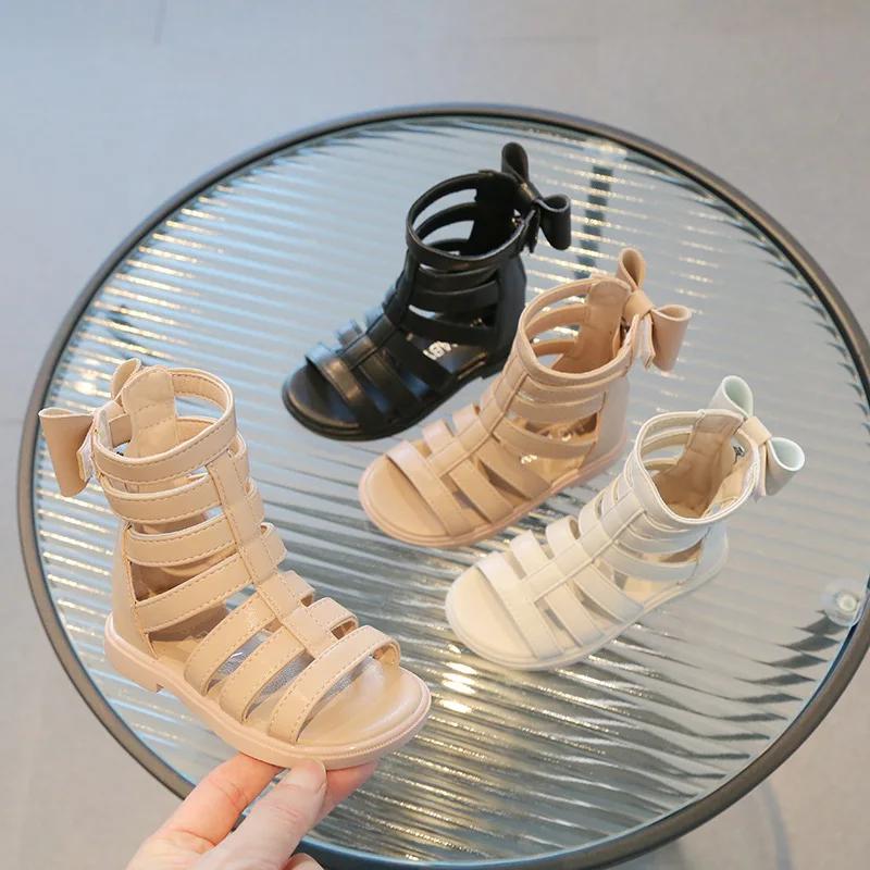 Сандалии для девочек с высоким голенищем, лето 2024 г., новые однотонные, корейский стиль, универсальные, принцесса, модные, детские, с бантом сзади, с открытым носком, на плоской подошве
