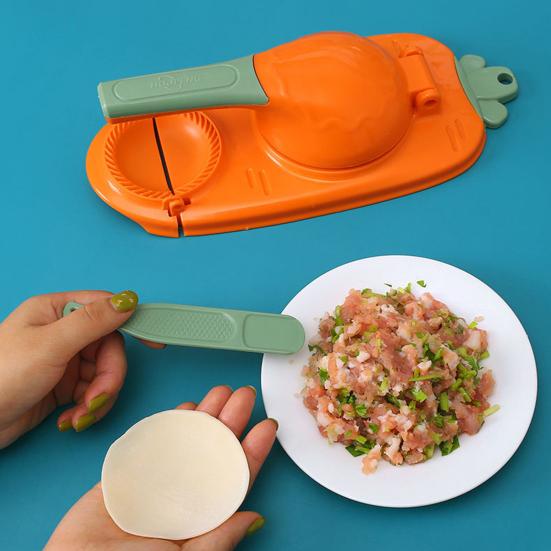 Производитель кожи для пельменей Пищевой класс Эргономичная ручка Высокоэффективное стабильное основание Конструкция с подвесным отверстием Экономия труда Пластиковое тесто Машина для прессования кожи пельменей