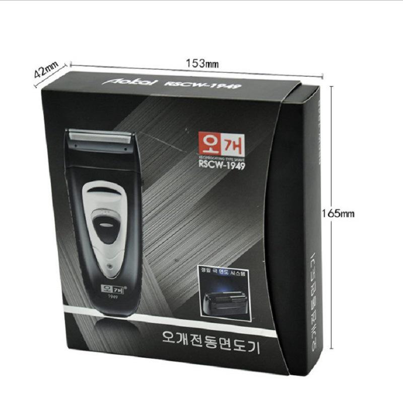 Корейская электробритва 1949 года, полностью моющаяся, с двумя головками возвратно-поступательного движения