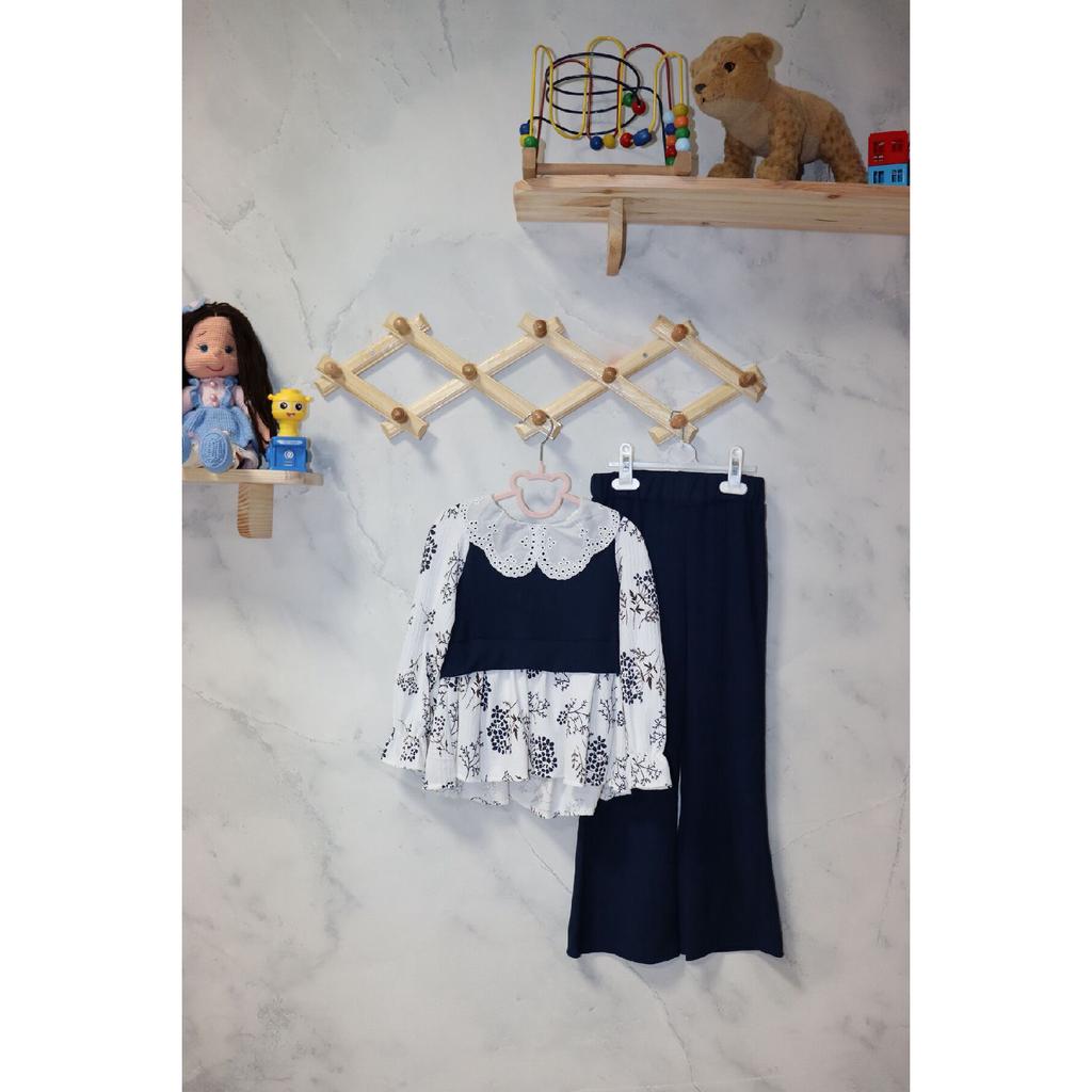 Стильный комплект для девочек - блузка с цветочным узором и современные брюки