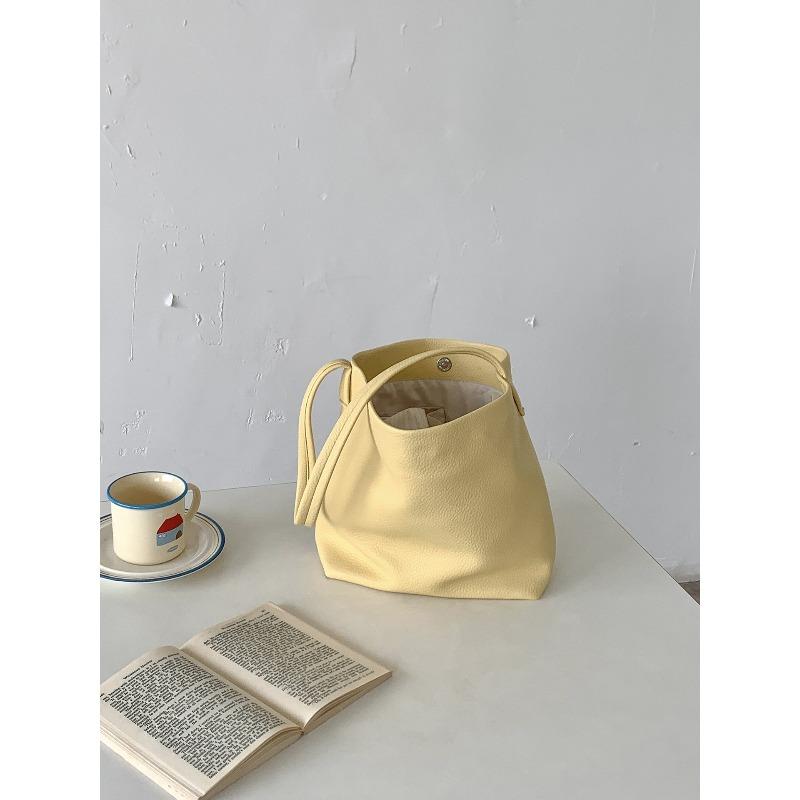 Small Simple Portable Shoulder Bag Niche Design Sense Work Commuter Bag Versatile Soft Leather Bucket Bag Women