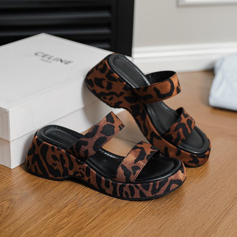 Thick-soled muffin wedge slippers summer wear French temperament fashion versatile one-word open-toe high-heeled beach shoes