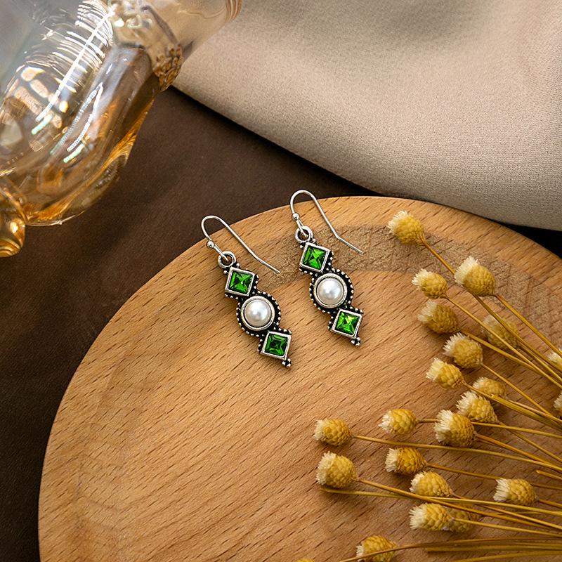 "European & American Retro Turquoise Feather Earrings: Bohemian Dragonfly, Bird, Water Drop, Round, & Pearl Designs"