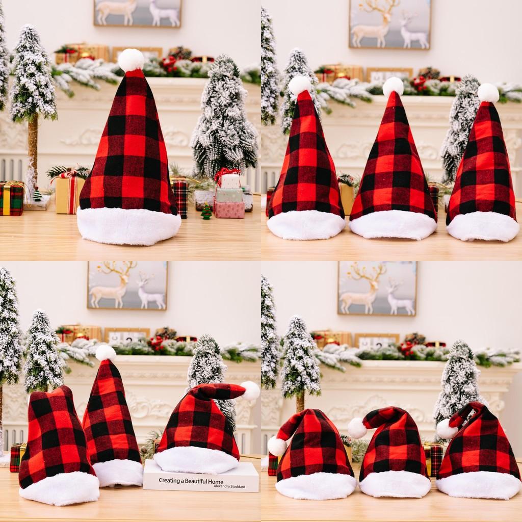 Cozy Red And Black Plaid Christmas Hat With Soft White Fur Pom Poms For Festive Cheer