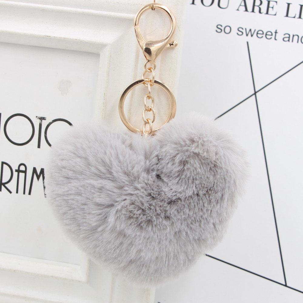 "Charming Heart-Shaped Rabbit Fur Keychain - Fashionable Fluffy Accessory for Ladies' Bags"