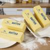В наличии Мягкая игрушка в виде сжатого бруска масла Подходит для детей и взрослых Подходит для вечеринок, игр, фестивалей и рождественских подарков