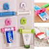 Random 1 Pcs ABS Rolling Squeezer Toothpaste Dispenser Tube Partner Sucker Hanging Holder JM08 ARI