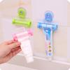 1 Pc Rolling Squeezer Toothpaste Dispenser Tube Sucker Hanging Holder ADM